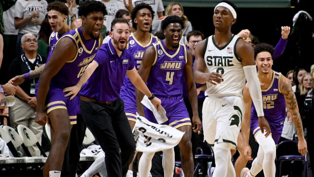 Michigan State Spartans guard Tyson Walker walks back to the bench